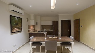 Devtraco Plus Ghana Limited Avant Garde two bedroom apartment - dining area and kitchen